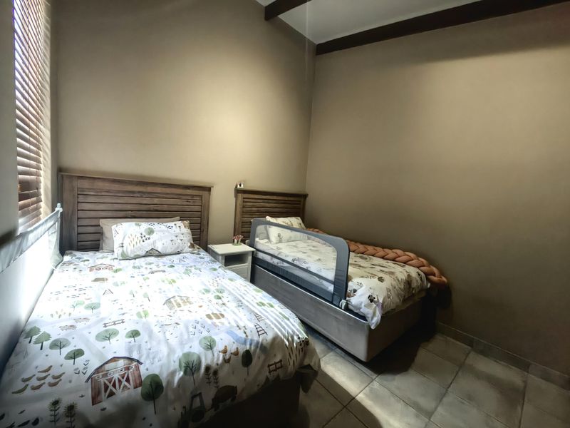 Spacious Modern Haven with Big Yard in Secure Gated Complex - Photo 10