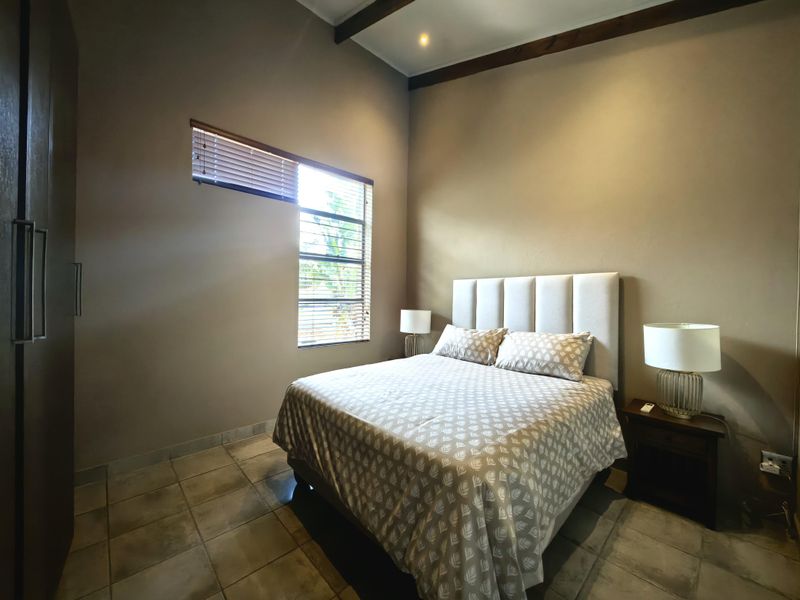 Spacious Modern Haven with Big Yard in Secure Gated Complex - Photo 9