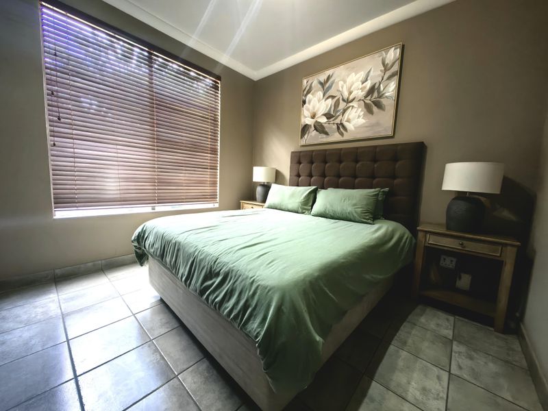 Spacious Modern Haven with Big Yard in Secure Gated Complex - Photo 7