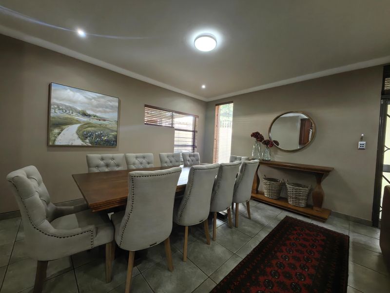 Spacious Modern Haven with Big Yard in Secure Gated Complex - Photo 6