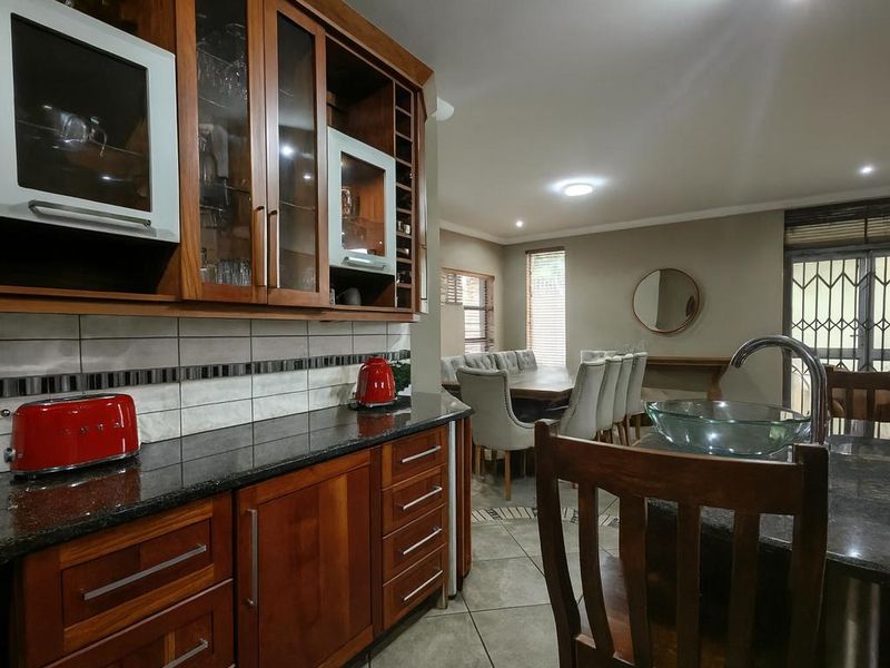 Spacious Modern Haven with Big Yard in Secure Gated Complex - Photo 3