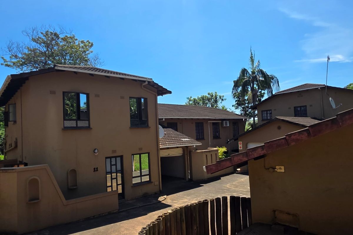 Cozy 2-Bedroom Duplex in a Secure Setting - Photo 2