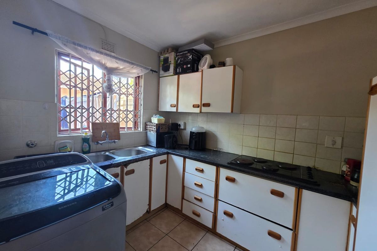 Cozy 2-Bedroom Duplex in a Secure Setting - Photo 3