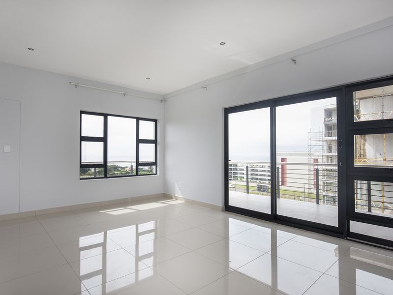 Coastal Elegance Meets Everyday Convenience 3 Bedroom Apartment - Photo 2