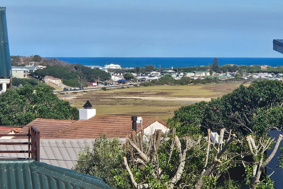 Beachy Elegance with Panoramic Estuary and Sea Views | Little England, Stilbaai - Photo 5
