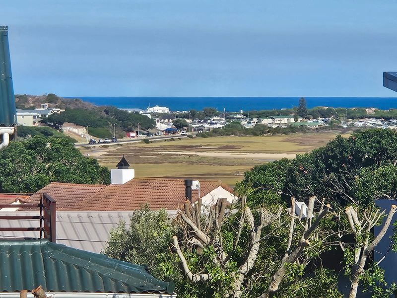 Beachy Elegance with Panoramic Estuary and Sea Views | Little England, Stilbaai - Photo 5