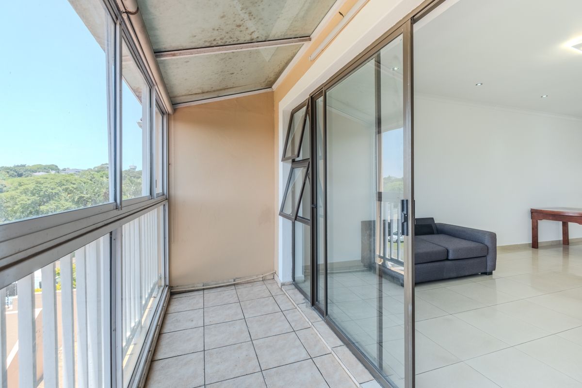 Secure Three Bedroom Townhouse with Sea Views in Prime Durban North - Photo 2
