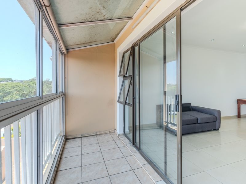 Secure Three Bedroom Townhouse with Sea Views in Prime Durban North - Photo 2