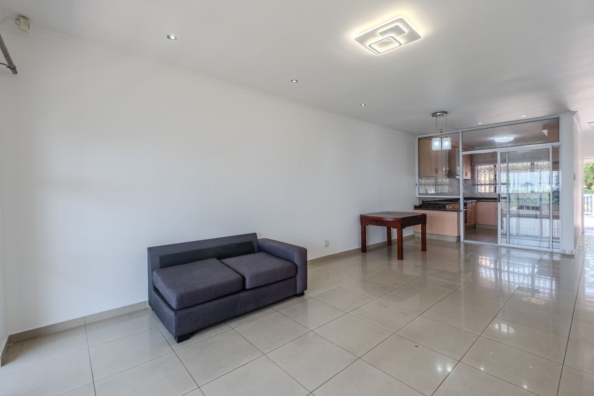 Secure Three Bedroom Townhouse with Sea Views in Prime Durban North - Photo 5