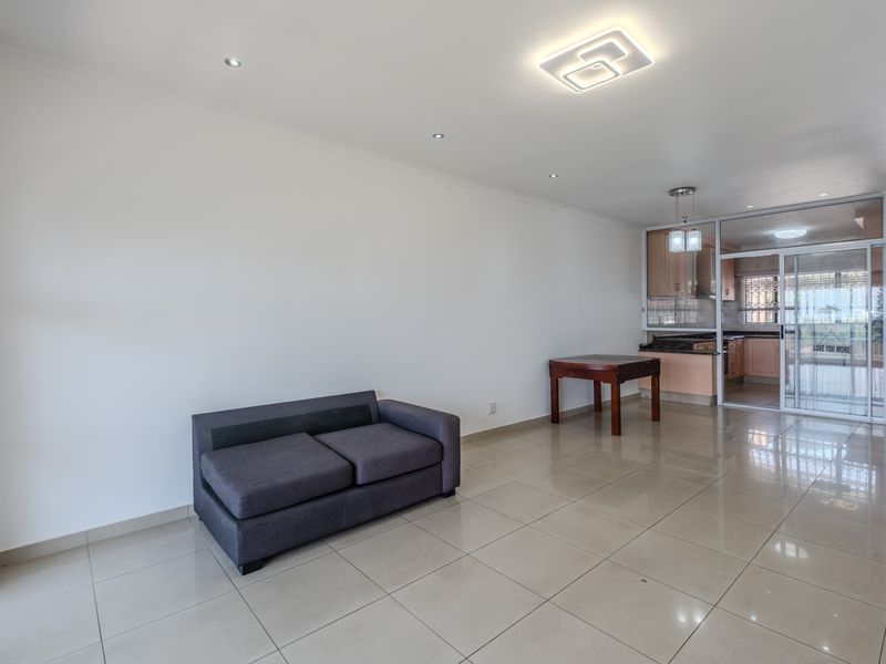 Secure Three Bedroom Townhouse with Sea Views in Prime Durban North - Photo 5