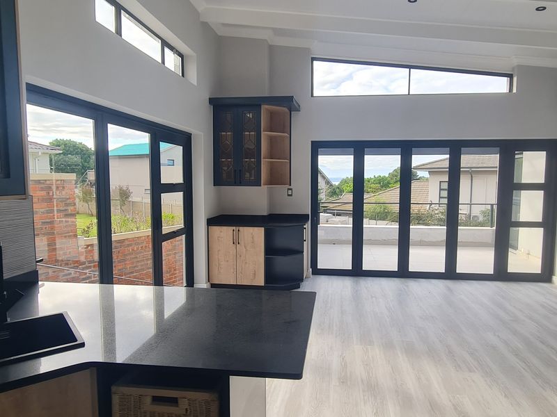Modern Luxury Home in Linkside – Spacious Family Living with Sea Views & Separate Guest Suite - Photo 8