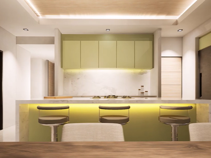 Modern kitchen featuring a central island with stone countertops, sage green cabinetry, integrated hob, and sophisticated recessed ceiling lighting.