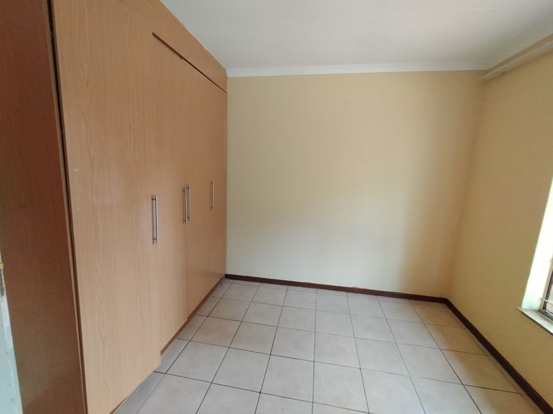 Well-Located Home Near Wonderpark with Lapa & Double Garage - Photo 8