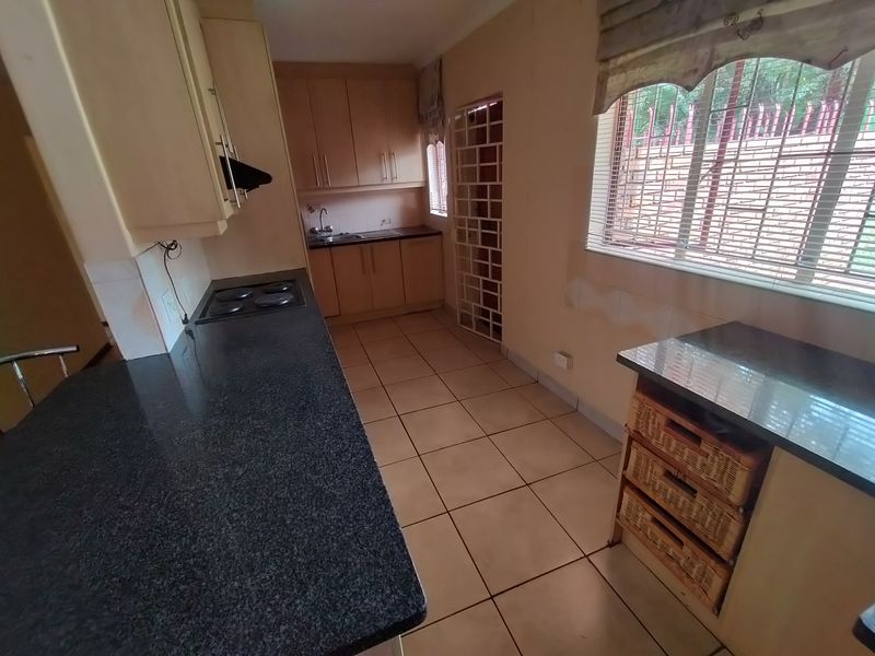 Well-Located Home Near Wonderpark with Lapa & Double Garage - Photo 7