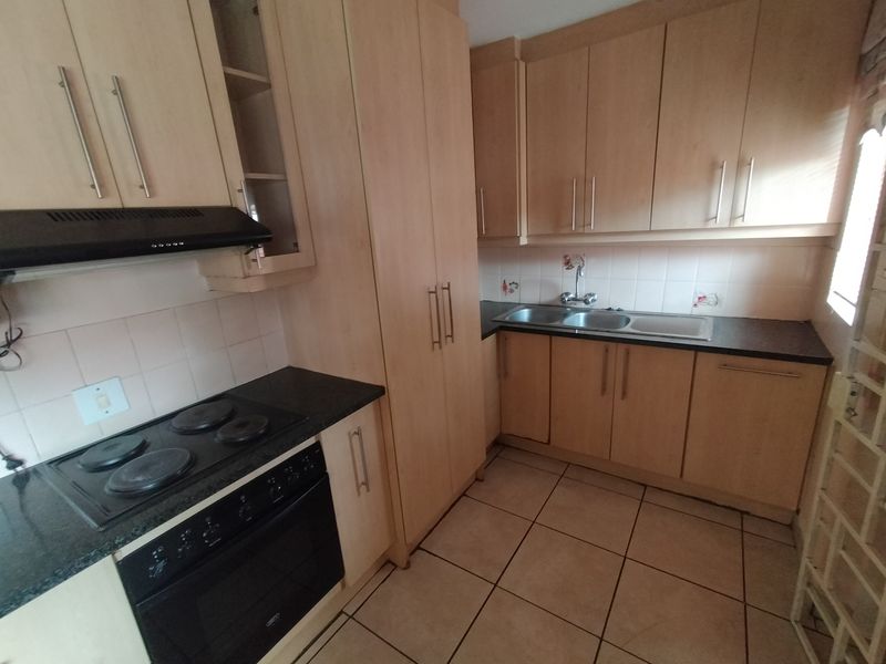 Well-Located Home Near Wonderpark with Lapa & Double Garage - Photo 6