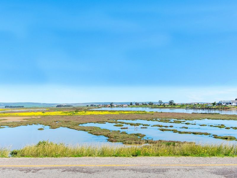 Riverfront living with Timeless charm — Perfectly Positioned! - Photo 8