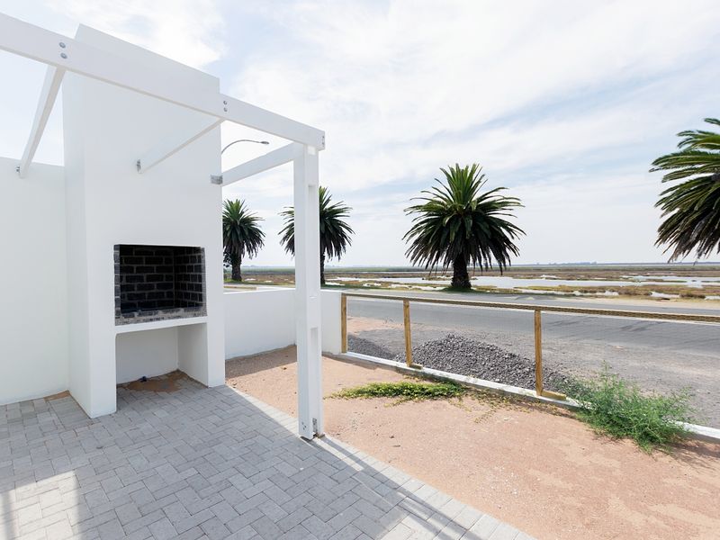 Riverfront living with Timeless charm — Perfectly Positioned! - Photo 5