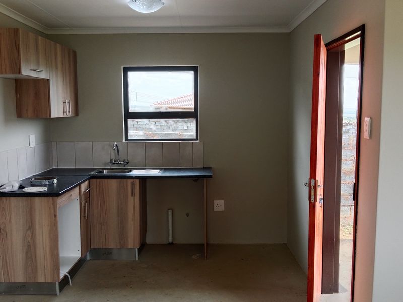 Newly Developed 3-Bedroom Home in Palm Ridge Ext 37 - Photo 9