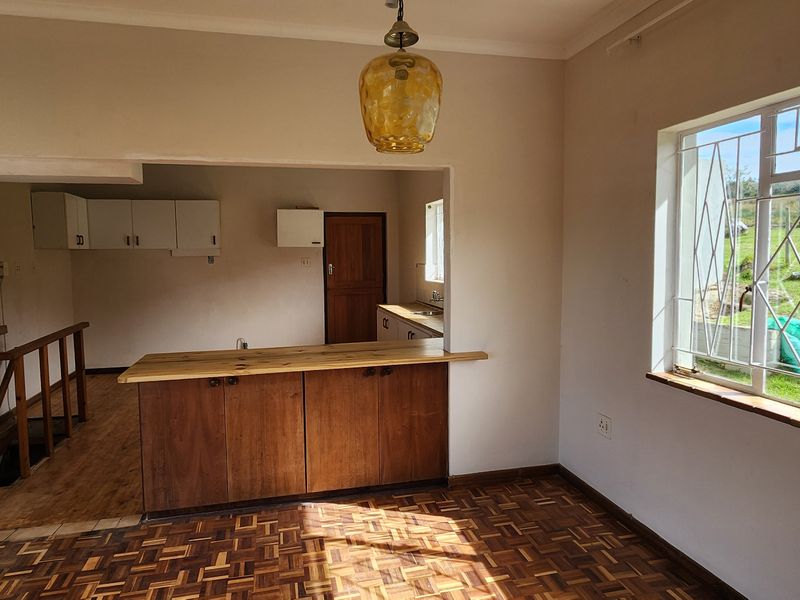 Spacious Family Home with 3 Vacant Plots & Mountain Views - Photo 8