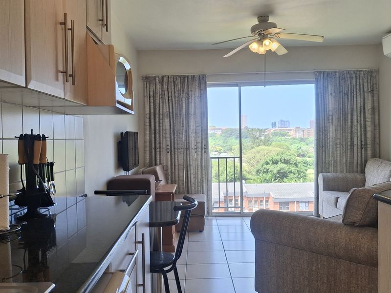 Coastal Living with Hints of Blue on the Horizon! Blink and it’ll be gone! - Photo 3