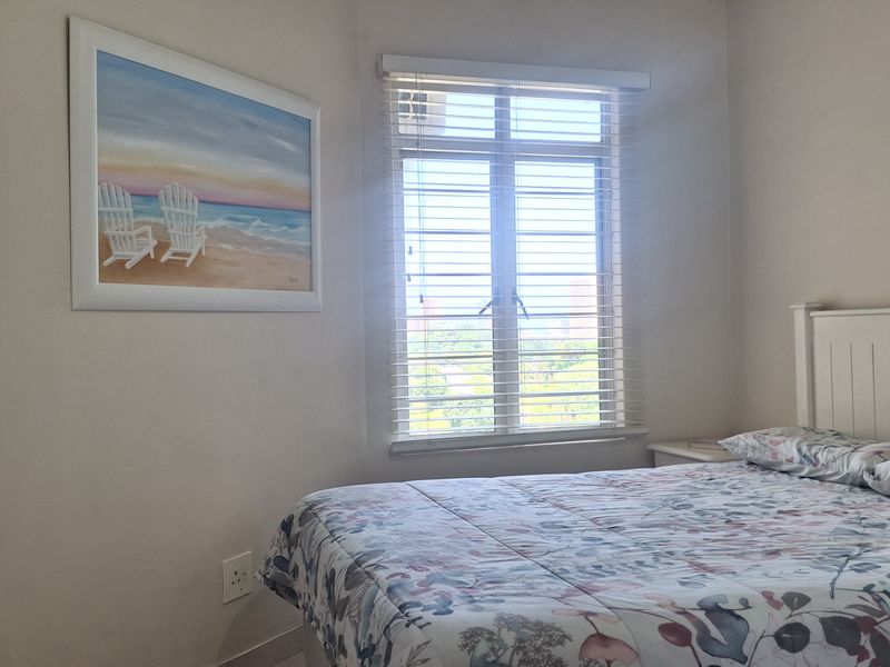 Coastal Living with Hints of Blue on the Horizon! Blink and it’ll be gone! - Photo 10