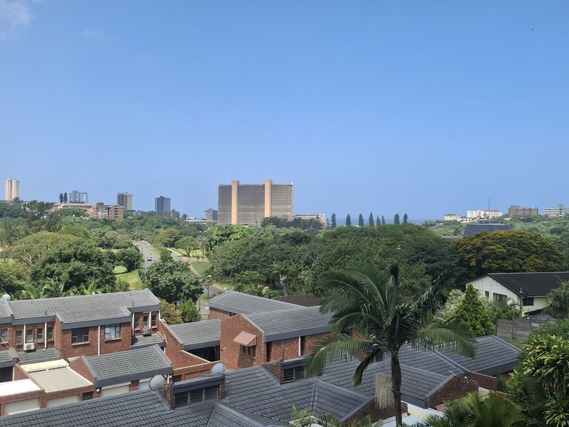 Coastal Living with Hints of Blue on the Horizon! Blink and it’ll be gone! - Photo 8