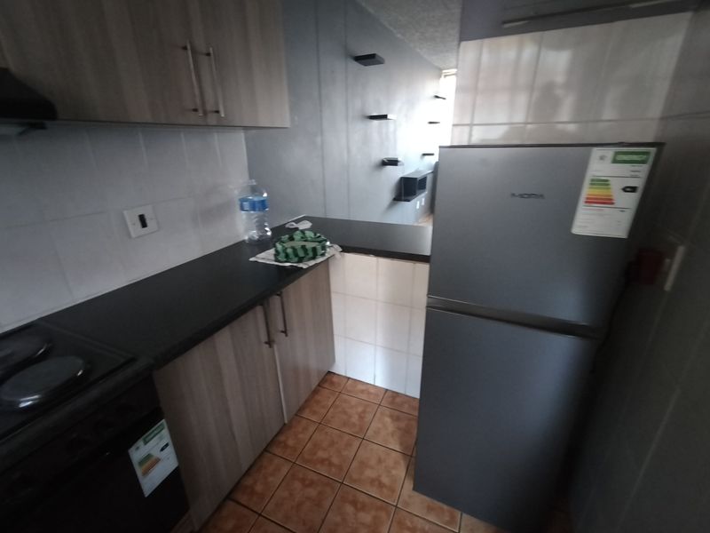 Ideal Starter Home or Investment in a Well-Maintained Complex - Photo 3