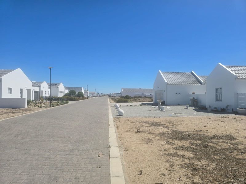 Lock Up and Go Coastal Living in a Secure Estate - Photo 9