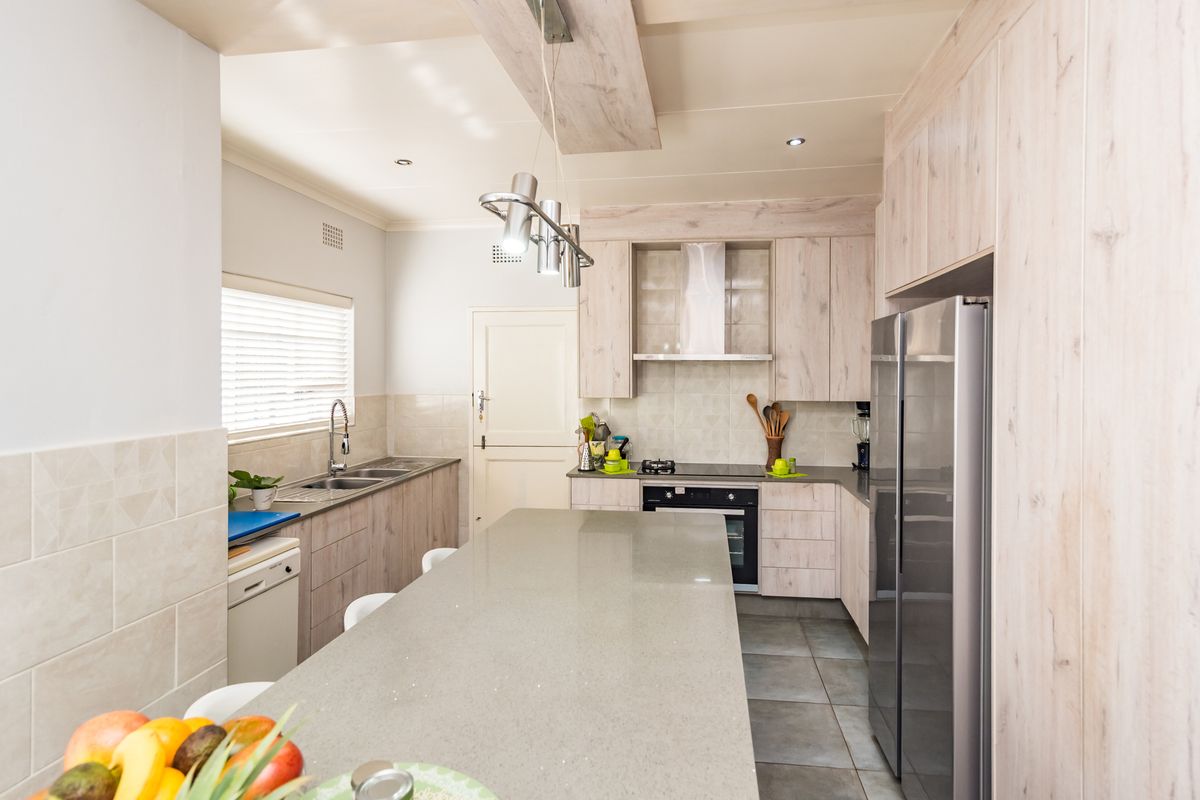 Spacious, Pristine Family Home in Prime Helderkruin Location - Photo 4