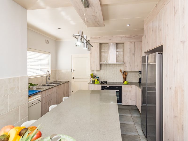 Spacious, Pristine Family Home in Prime Helderkruin Location - Photo 4