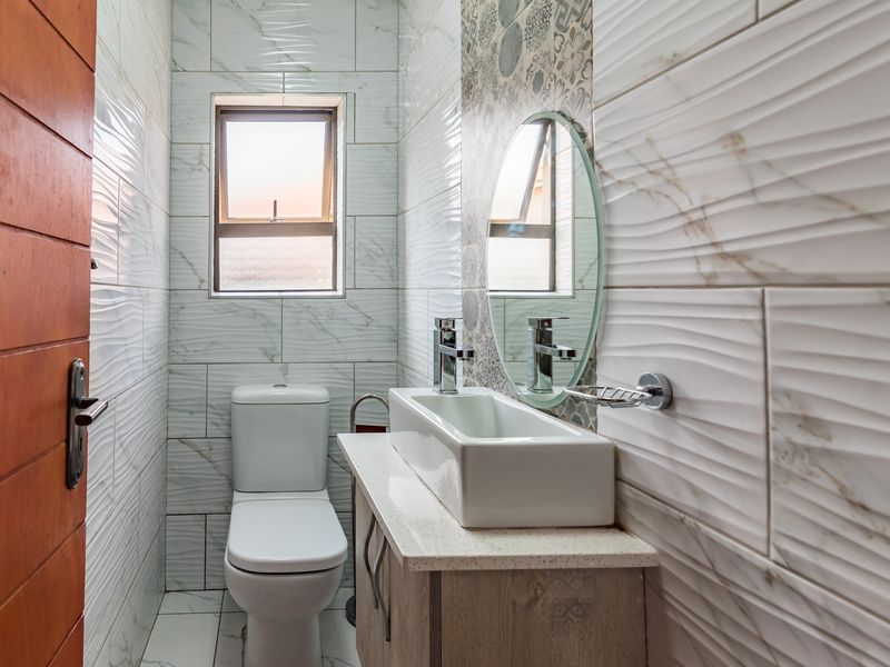 Modern Three-Bedroom Home in Secure Estate - Photo 10