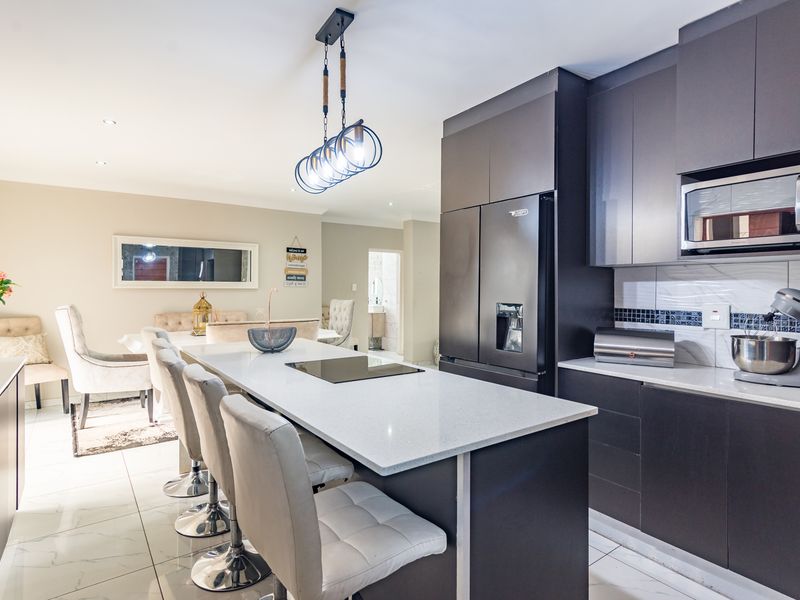 Modern Three-Bedroom Home in Secure Estate - Photo 7