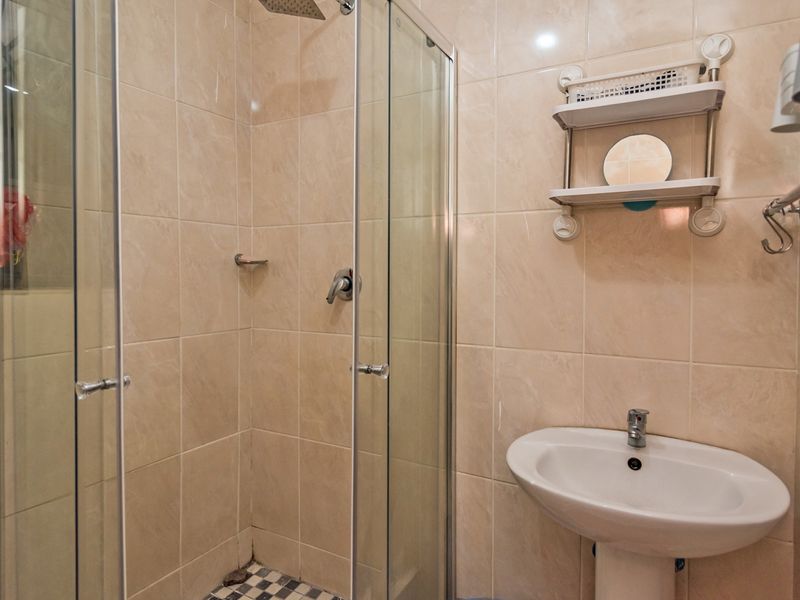 Neat 2-Bedroom Freehold Home with Solar Backup in Fleurhof Ext 2 - Photo 8