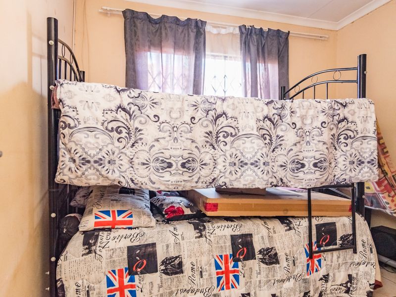 Neat 2-Bedroom Freehold Home with Solar Backup in Fleurhof Ext 2 - Photo 4