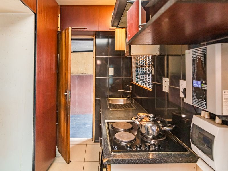 Neat 2-Bedroom Freehold Home with Solar Backup in Fleurhof Ext 2 - Photo 2