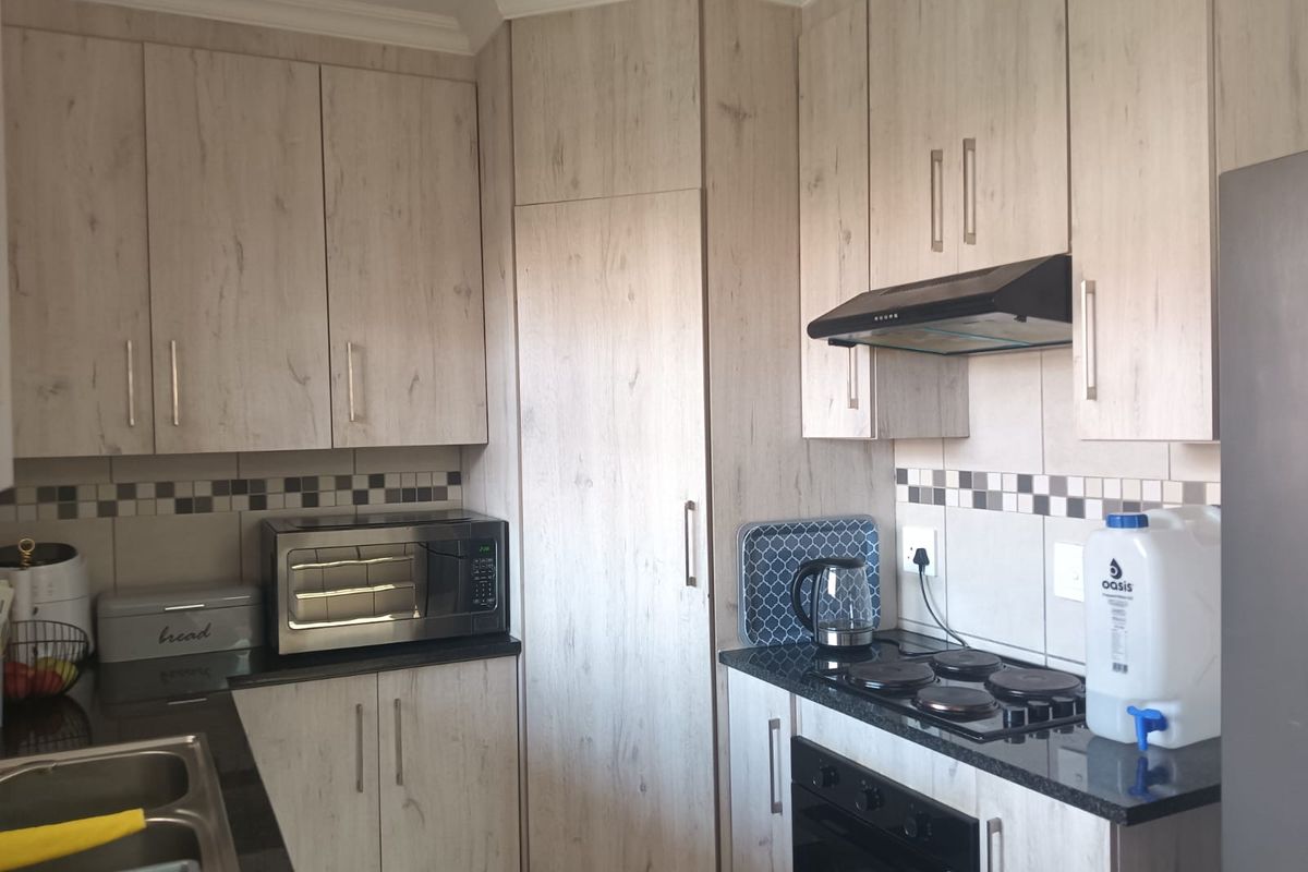 Well-Maintained Three-Bedroom Residence - Photo 3