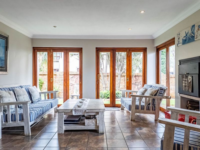 Versatile 4-Bedroom Double-Storey Home with Solar & 3 Garages in Bougainvillea Estate - Photo 9