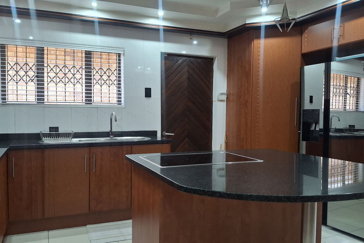 Stunning Face Brick Family Home on a Corner Stand in a desirable area! - Photo 4