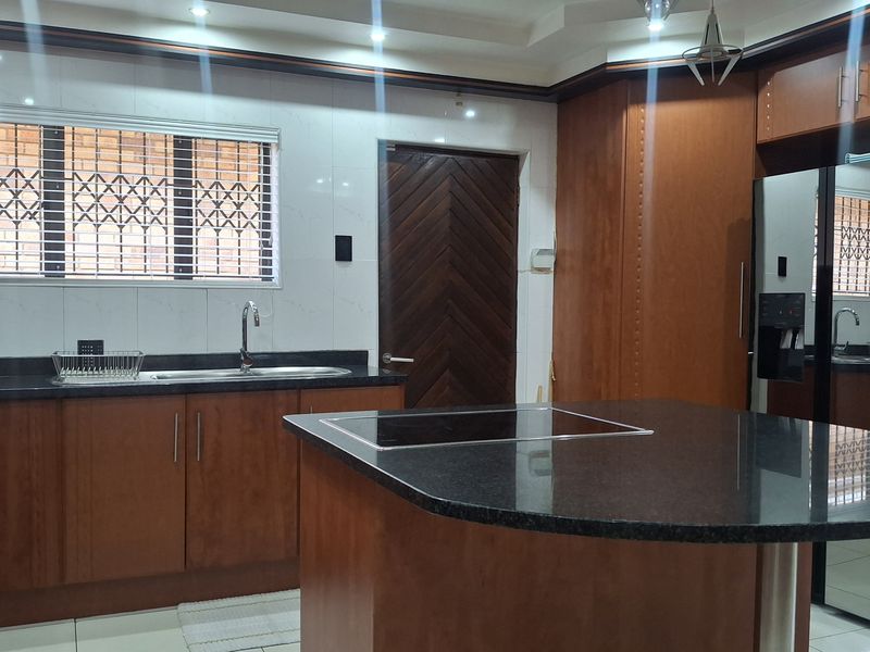 Stunning Face Brick Family Home on a Corner Stand in a desirable area! - Photo 4