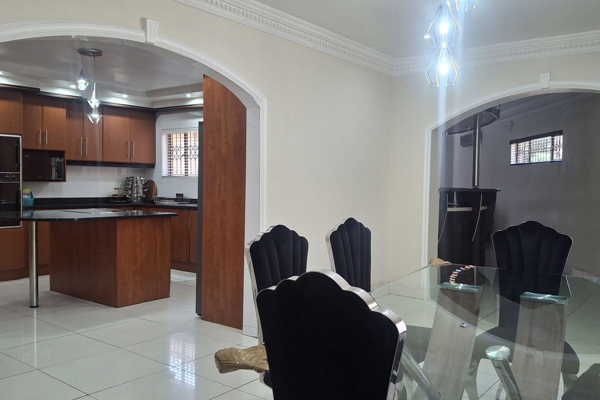 Stunning Face Brick Family Home on a Corner Stand in a desirable area! - Photo 5