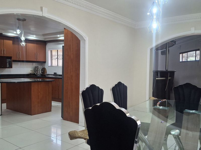 Stunning Face Brick Family Home on a Corner Stand in a desirable area! - Photo 5