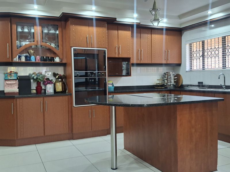 Stunning Face Brick Family Home on a Corner Stand in a desirable area! - Photo 3