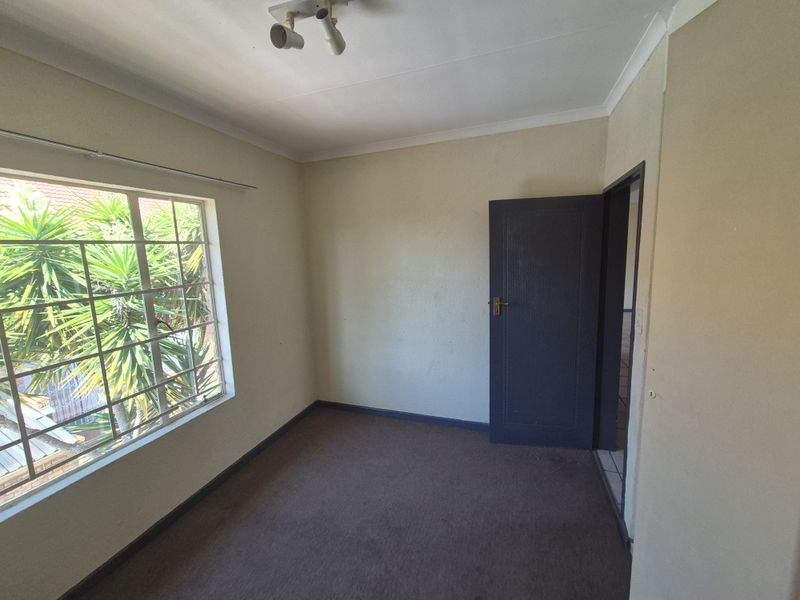 Spacious Townhouse Brimming with Potential - Photo 10