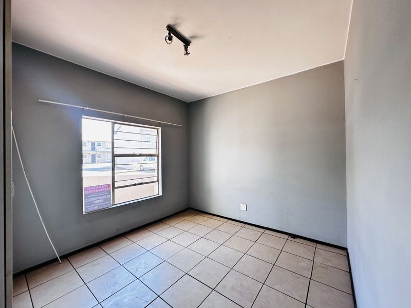 One-Bedroom Ground Floor Unit with Patio & Built-In Braai - Photo 8