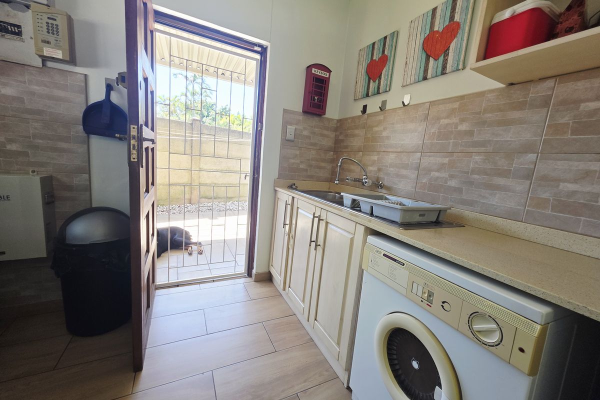 Elegant Family Living with Modern Luxury & Solar Efficiency - Photo 4