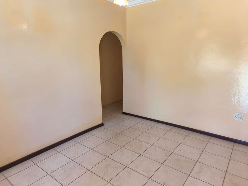 Three Bedroom Family Home For Sale in Thamaga Street, Jouberton - Photo 5