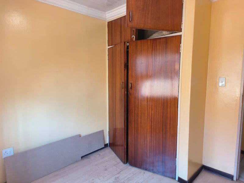 Three Bedroom Family Home For Sale in Thamaga Street, Jouberton - Photo 10