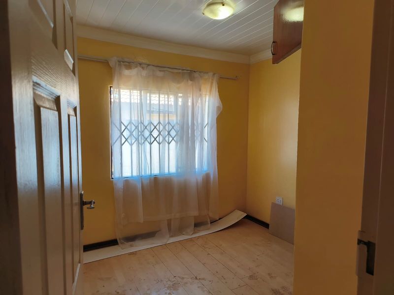 Three Bedroom Family Home For Sale in Thamaga Street, Jouberton - Photo 8