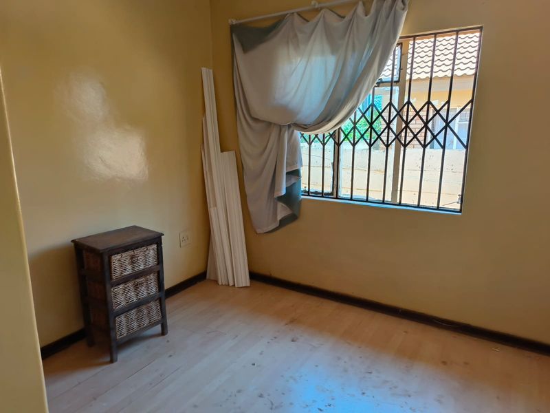 Three Bedroom Family Home For Sale in Thamaga Street, Jouberton - Photo 6