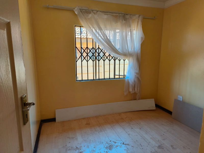 Three Bedroom Family Home For Sale in Thamaga Street, Jouberton - Photo 7